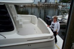 The cockpit area with a walk-through transom housing a reel-type shore power system - it has forward and aft shore power (a 50 amp, 220 volt system)