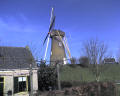 An authentic windmill -- This windmill was relocated to it&#39;s present position, and although it&#39;s a tourist attraction, it&#39;s still in daily use to grind wheat into flour.