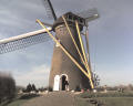 another picture of the windmill -- This shows the method used to keep the sails facing the wind - all manually done by the caretaker of the windmill.