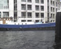 LOTS of boats in Amsterdam -- There are roughly 25000 houseboats moored alongside the canal bulkheads in Amsterdam. The city now has an ordinance prohibiting any more houseboats.