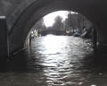 Seven arches -- This is an interesting canal in Amsterdam, where you can see seven arches all lined up in a row. Although the water was brown, it wasn&#39;t filthy - more like silt. The city was remarkably clean.